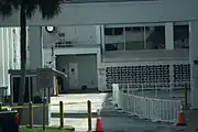 Exit door from Operations and Checkout Building connector. A nearby doorway on the adjacent north wall of the rear building is where Astronauts would board the Astrovan for transport to Launch Complex 39