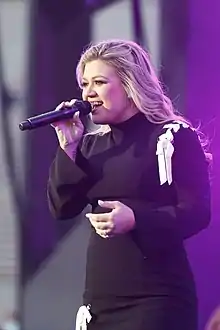 An image of Clarkson singing