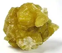 Yellow lepidolite from Itinga, Minas Gerais, Brazil. Size: 6.1 x 4.9 x 3.1 cm