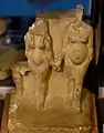 Limestone statuette of Akhenaten and Nefertiti, or Amenhotep III and Tiye, and a princess. Reign of Akhenaten. From Amarna, Egypt. The Petrie Museum of Egyptian Archaeology, London