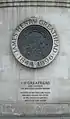 Plaque showing the tunnelling shield, with inscription
