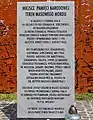 The memorial plaque that was added to the memorial in 2010