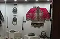 Coat, belt buckles and decorations