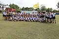 A group photo of Nan Chiau High School track and field team at the Inter-school Combined Sports Meet in 2013.