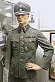 Officer uniform with medals and cuffband Nordland of the Regiment Nordland, Lofoten War Museum, Norway.