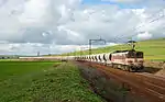 E 1100 with an empty phosphate train near Tamdrost