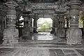 Ornate mantapa (hall) and lathe turned  pillars with decorative base containing relief