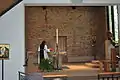 Side view of the altar and one of the nuns at the Abbey of Our Lady of the Mississippi.