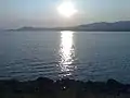 The Zemplínska Šírava reservoir from the shore in Jovsa, Medvedia hora peninsula seen in distance