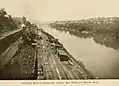 Pencoyd Iron Works, in 1914, at background left. Pencoyd Bridge is visible in the background center.
