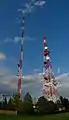 Front, right: steel lattice, communications tower; Middle, left: „old”, second mast — 102m; Rear, center: main mast — 331m