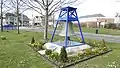 The bell, displayed on Wyndham Way.