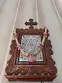 The portrait of St. Thomas is venerated here was brought from the Carmelite Monastery Mannanam in 1897 by "Albhutha Mathai", pursuant to a revelation. This portrait is mounted in a decorated waft of great artistic value.