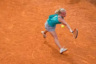 Image 6Richèl HogenkampPhotograph credit: Carlos DelgadoRichèl Hogenkamp (born 16 April 1992) is a professional tennis player from the Netherlands. Her highest WTA singles ranking is 94, which she reached on 24 July 2017. On the ITF Women's World Tennis Tour, she has won 16 singles and 14 doubles titles. This photograph depicts Hogenkamp competing at the 2015 Madrid Open.More selected pictures