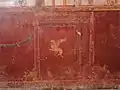 Room 24 South Wall Socle Right Griffin
