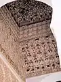 Partial view of the muqarnas vault in front of the mihrab