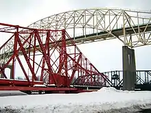 The emergency swing dam, with the International Bridge and International Railroad Bridge in the background