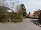 Schöppingen, view to a street: die Bergstrasse with  sculpture