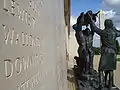 Names on the wall and one of two sculptures by Ian Rank-Broadley.