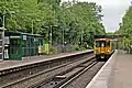 A Class 508 arrives with a service to Hooton.