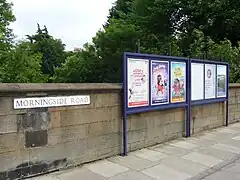 Railway advertising on the bridge over the tracks