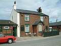 The Dolphin Inn (Flying Fish)(Built by the Wilkins family).