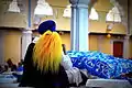 Orange-colored chauri used to fan Sikh scripture in respect