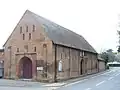 Thorpe Village Hall, built in the 17th century as a barn. Grade II listed building since 1951.