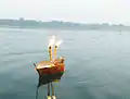 Boat floating on the river during the festival