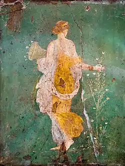 Flora dispensing flowers (astr. symbol )