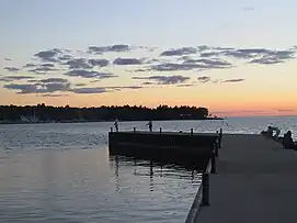 People fishing from the pier at Weborg Point