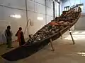 "What does the vessel contain, that the river does not" by Subodh Gupta