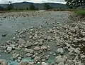 Wide flood-bed of River Doe