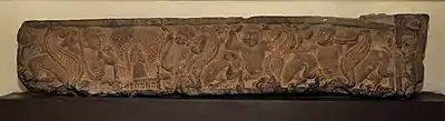 Linga inside a railing (left), being worshipped by Gandharvas winged creatures. Art of Mathura, circa 100 BCE.
